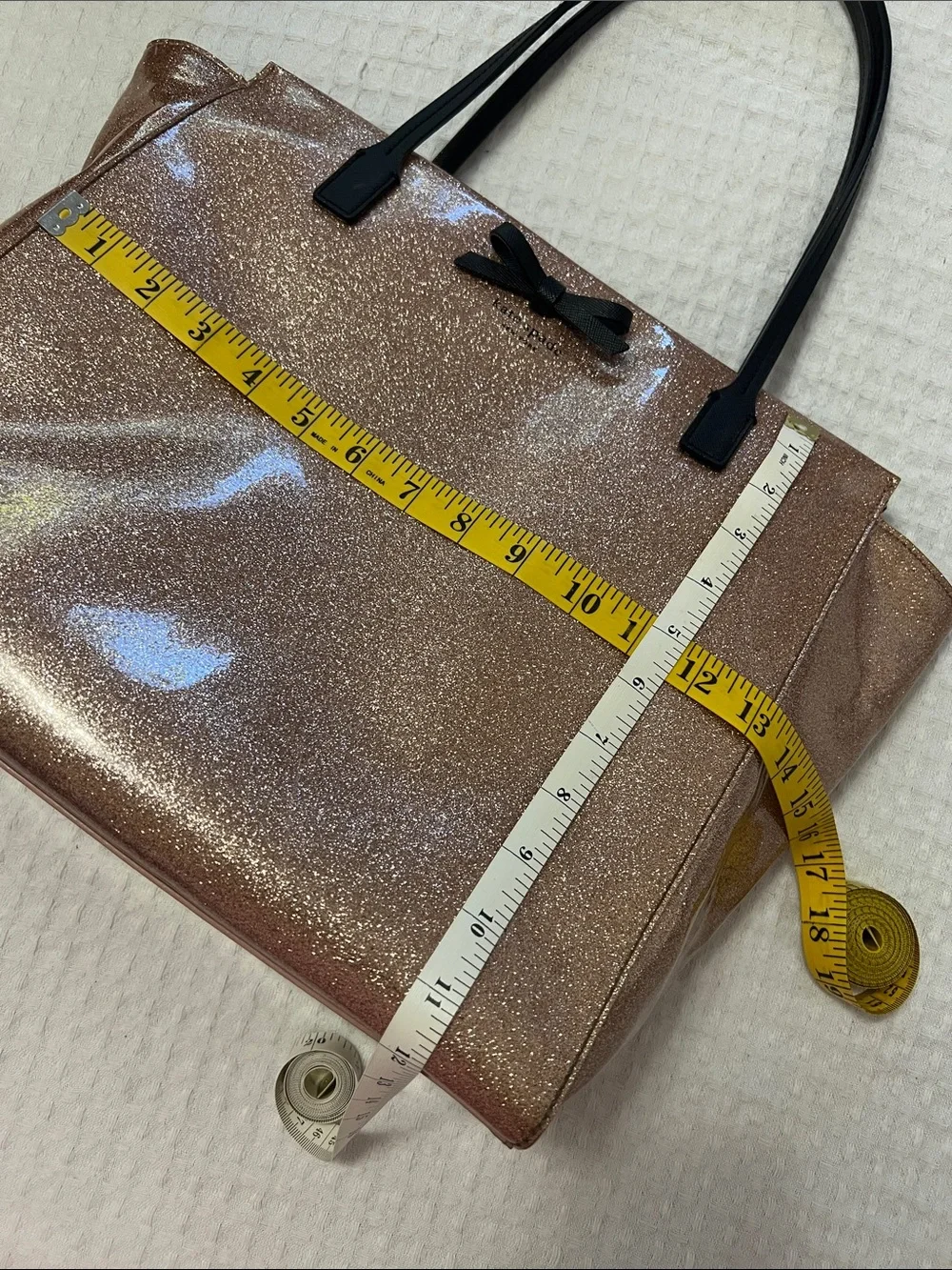 Kate Spade Rose Gold Glitter Tote with Black Bow and Black Handles